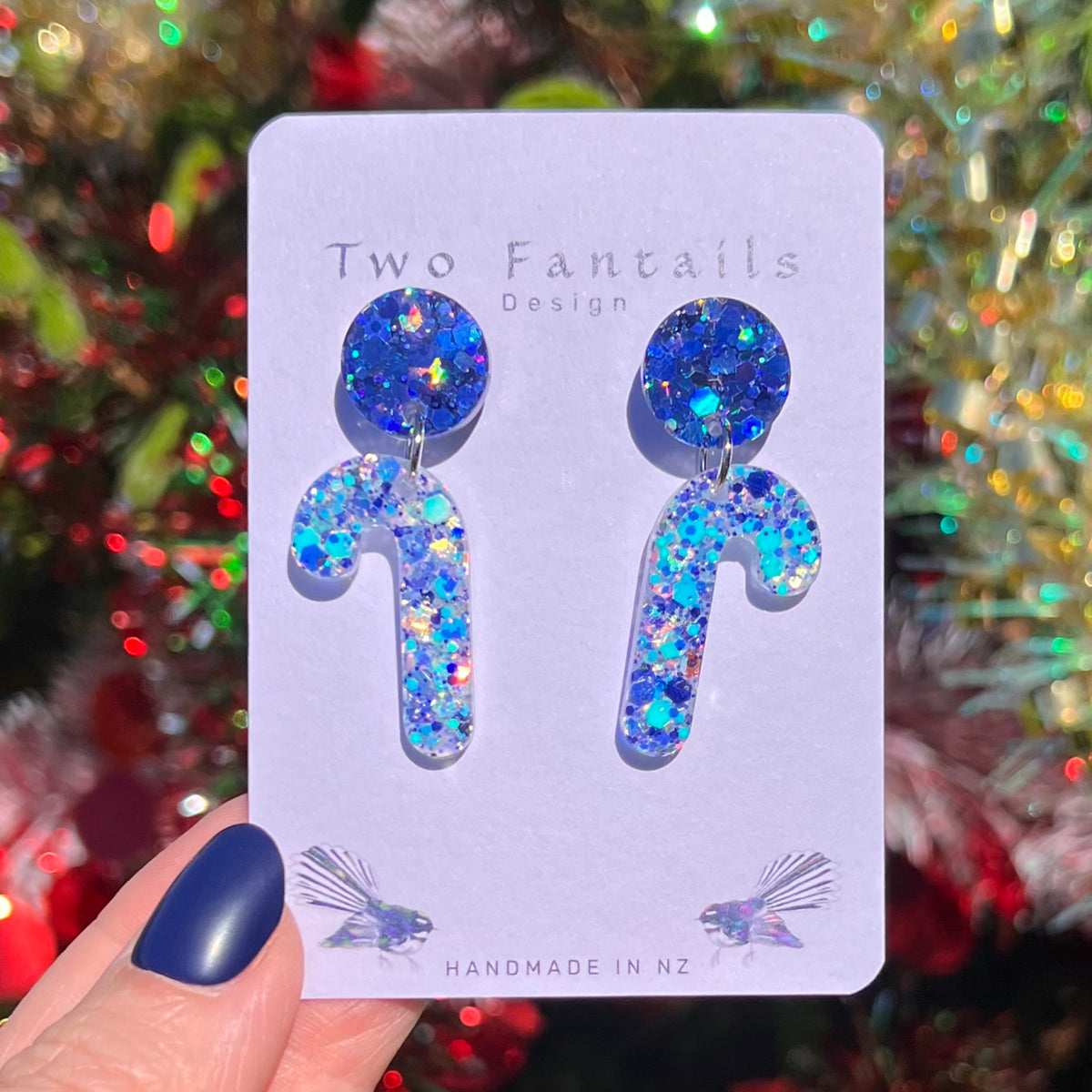 Icy blue and silver glitter candy canes with deep blue glitter round studs
