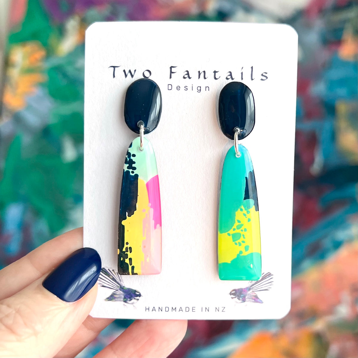 Colourful hand-painted abstract long dangle earrings in mint teal yellow pink and black with glossy dark stud tops by Two Fantails Design