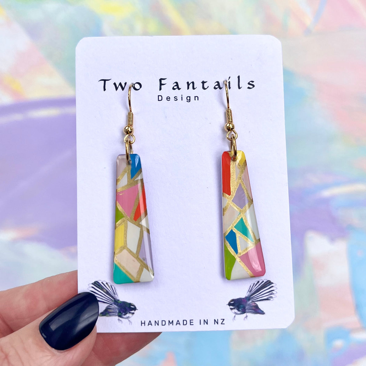Multicolour tapered dangle earrings with metallic gold mosaic outlines on Two Fantails Design card