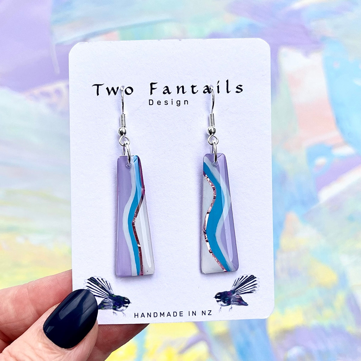 Lilac tapered dangle earrings with blue, white and rose-gold wavy stripes