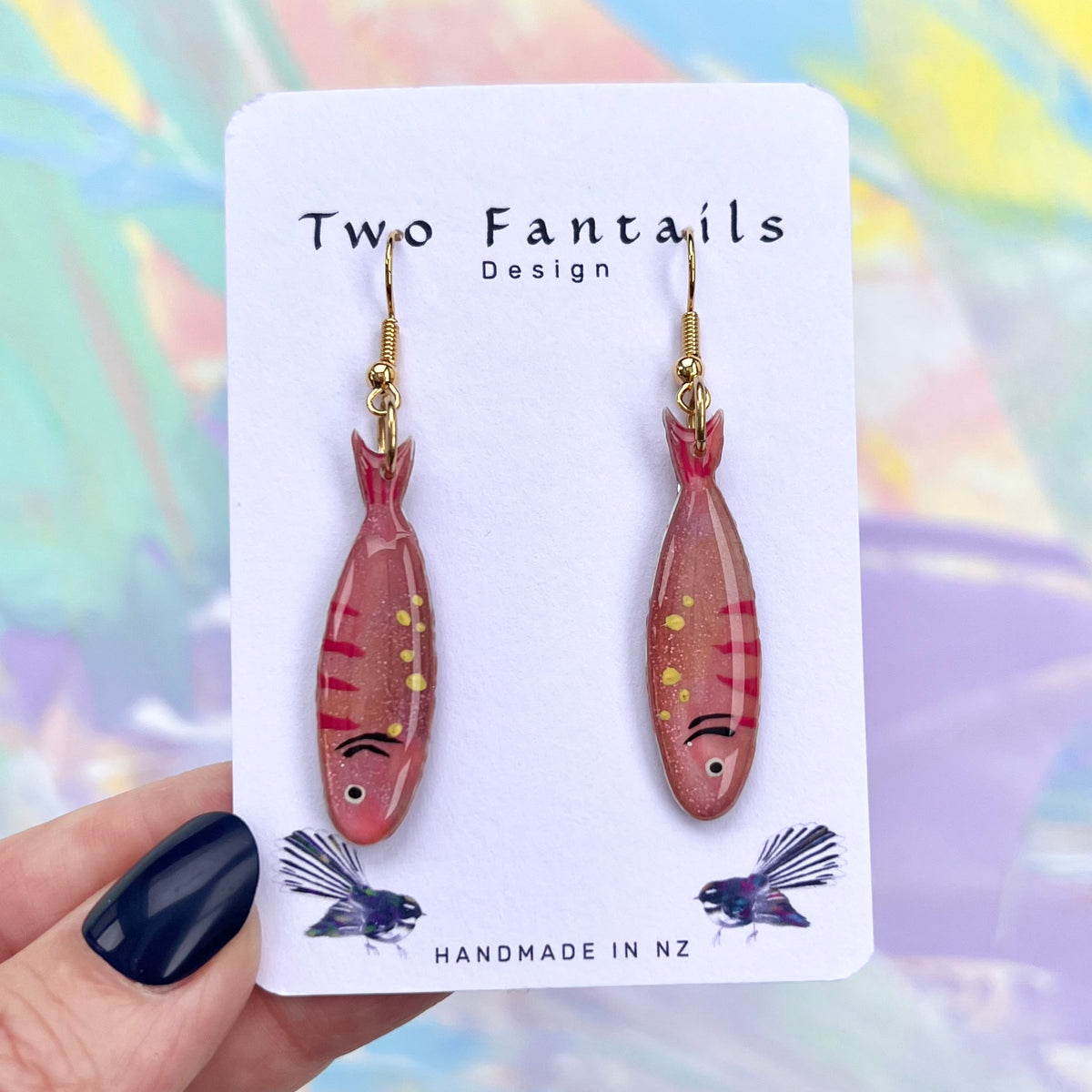 Pink glittery hand-painted sardine fish dangle earrings with gold-tone hooks