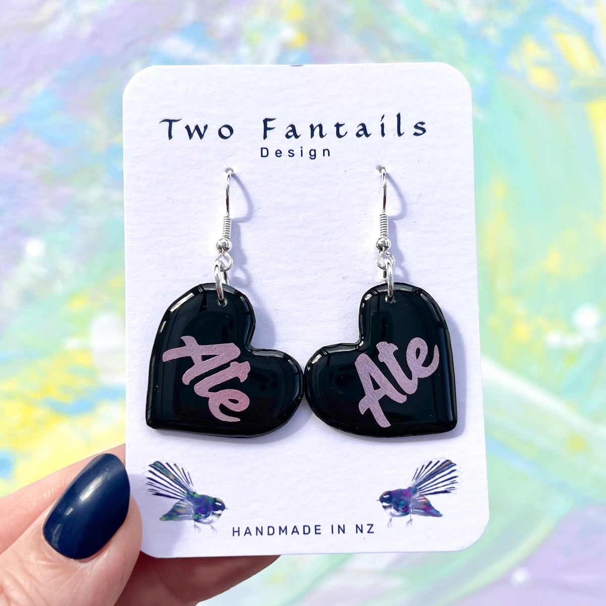 Black heart earrings with lilac Ale lettering and silver-tone hooks