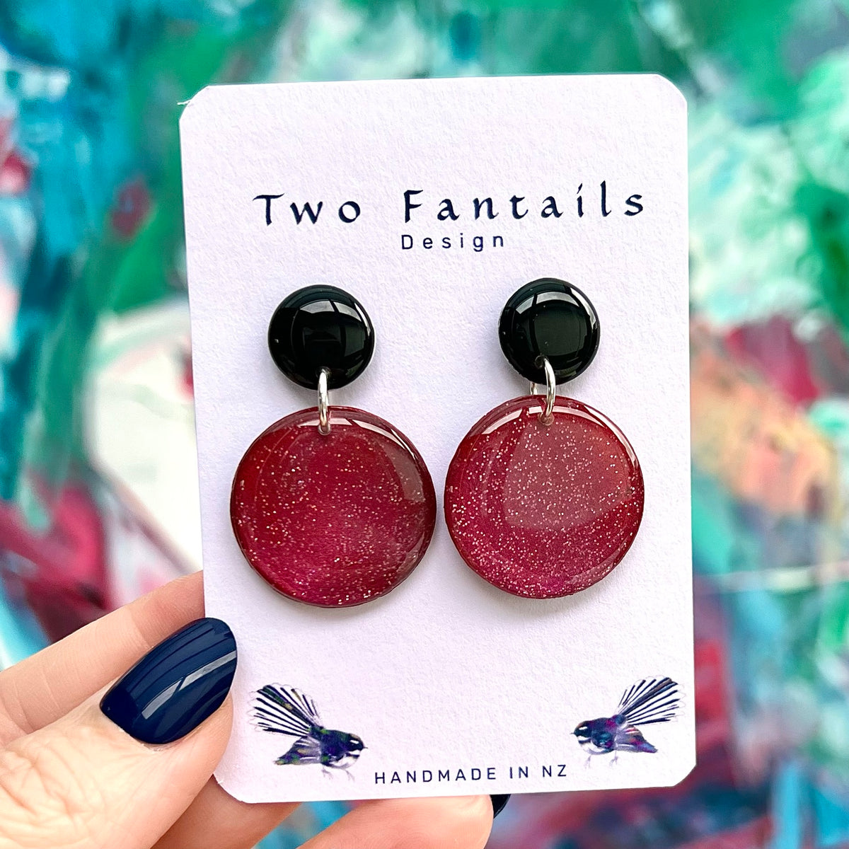 Cherry Bomb black stud earrings with glittery cherry red round drops
