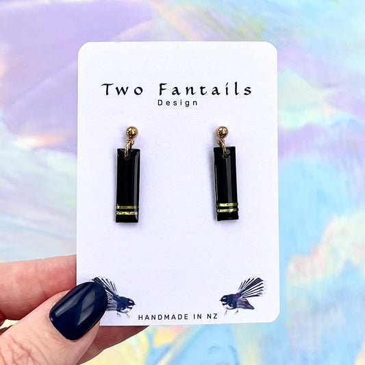 Glossy black rectangular drop earrings with two gold stripes and gold-tone ball studs