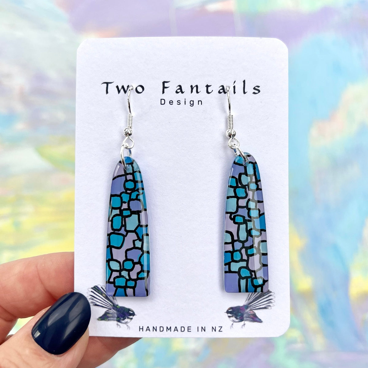 Long blue turquoise and lilac abstract mosaic earrings with black outlines and silver-tone hooks