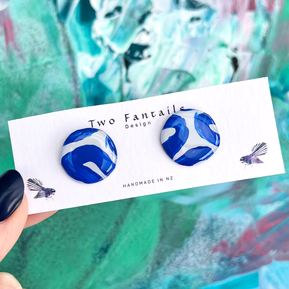 Round hand-painted cobalt blue and white abstract swirl statement stud earrings
