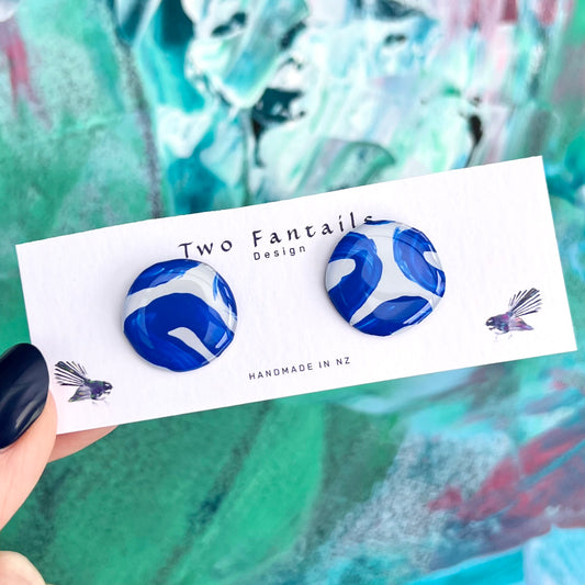 Round hand-painted cobalt blue and white abstract swirl statement stud earrings