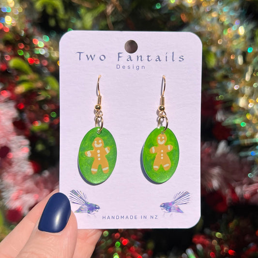 Green shimmer oval drops with cheerful gingerbread figures