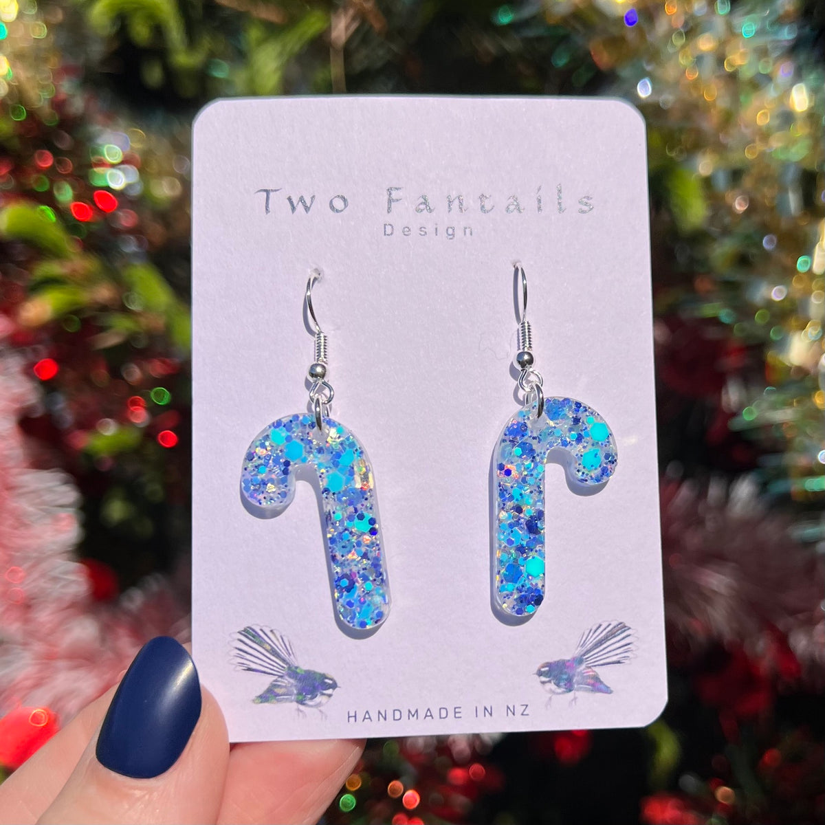 Sparkling blue and silver glitter candy cane earrings