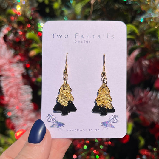 Black Christmas tree earrings with shimmering gold foil detail