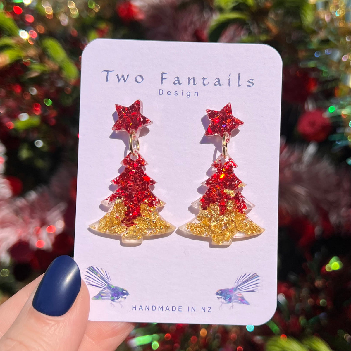 Statement Christmas trees with red and gold glitter and matching red star studs