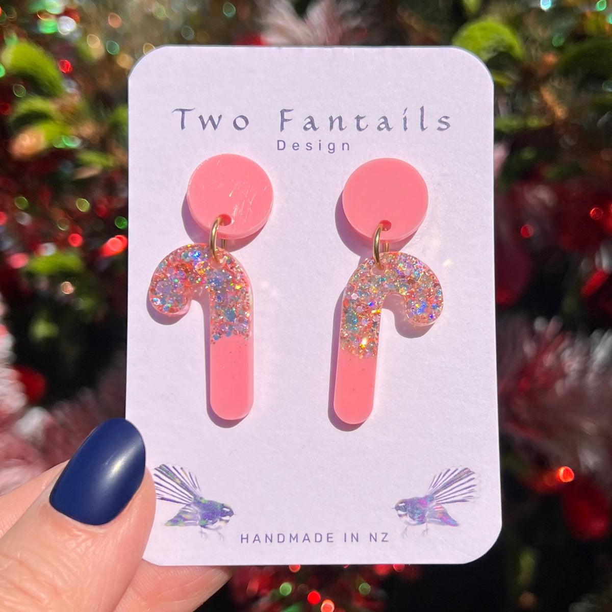 Pink candy cane drops with sparkling multicolour glitter and pink round stud tops