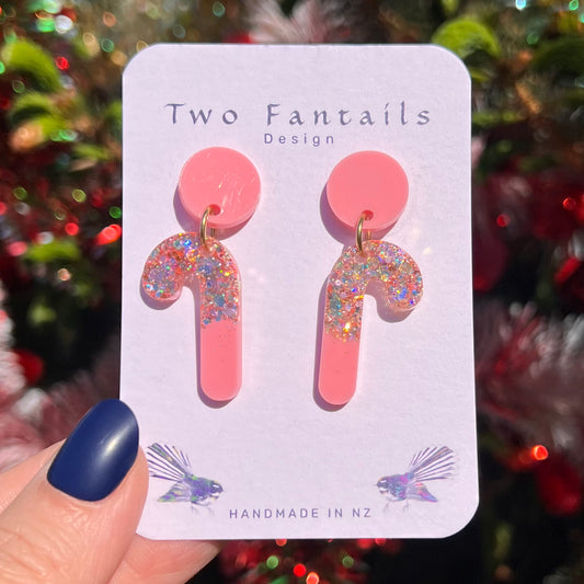 Pink candy cane drops with sparkling multicolour glitter and pink round stud tops