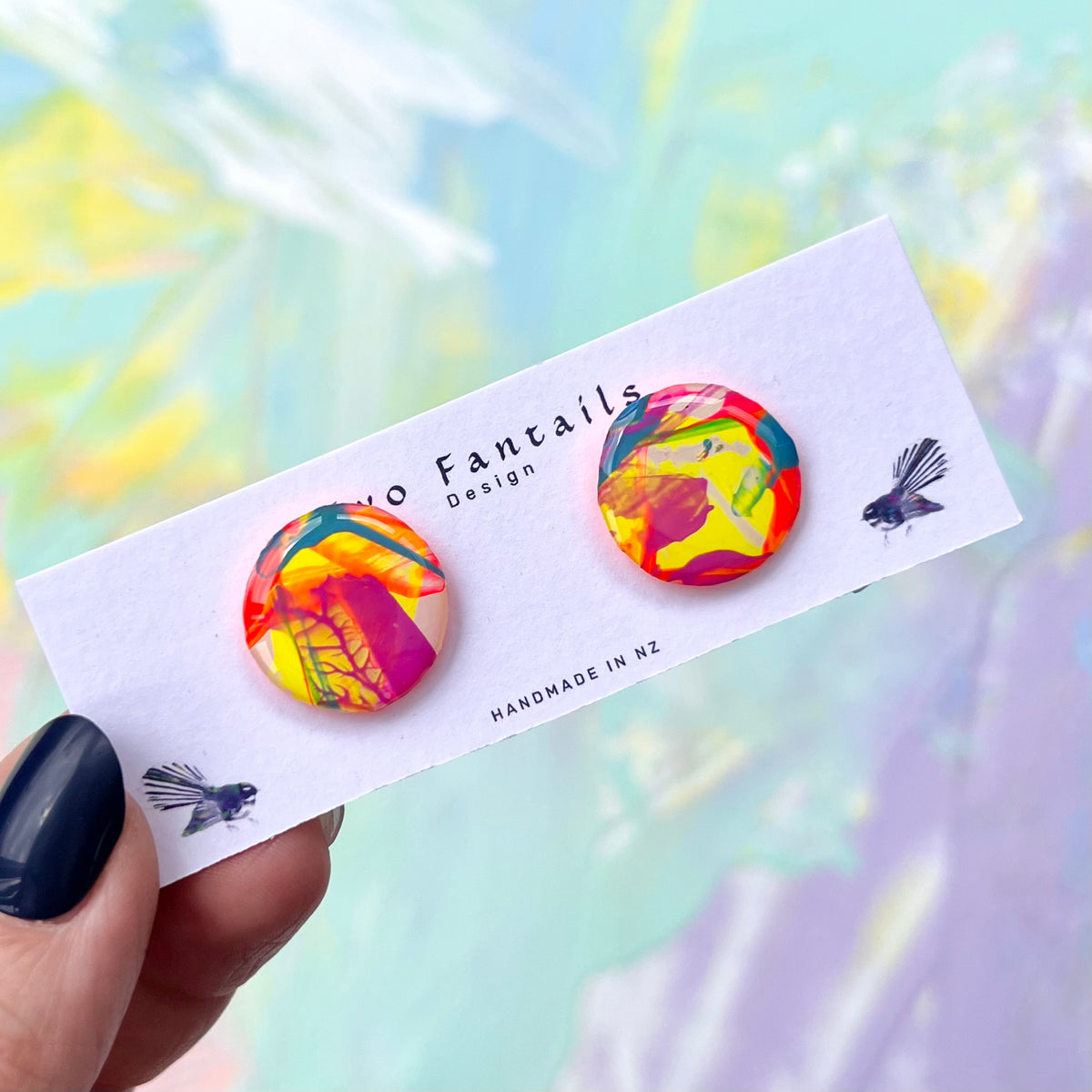Round handpainted earrings in bright pink yellow orange teal and purple abstract brushstrokes