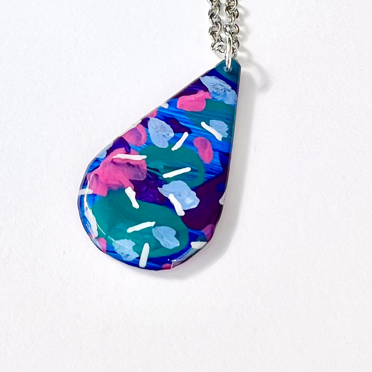 Close up of Colour Confetti teardrop pendant