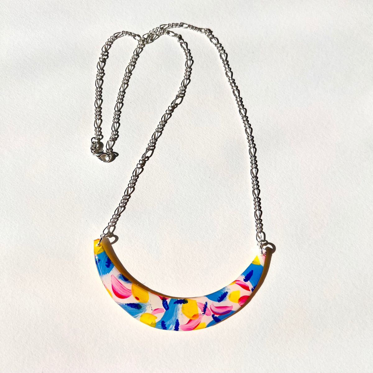 Colour Outside the Lines abstract crescent necklace full view