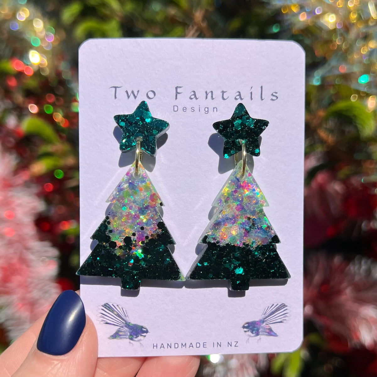 Emerald green glitter Christmas trees with iridescent sparkling upper sections and green glitter star studs