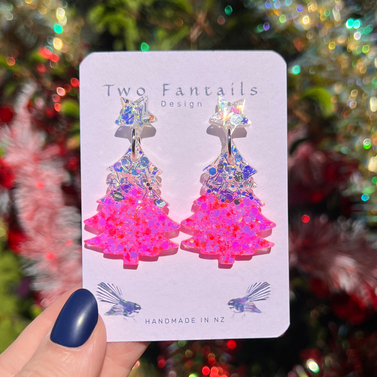 Pink glitter Christmas trees with iridescent silver-blue sparkle and star studs
