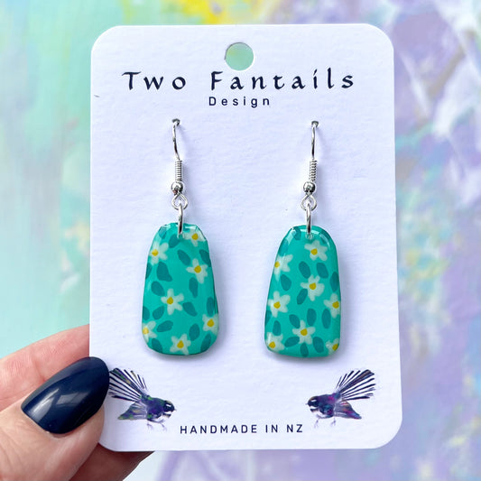 Turquoise trapezoid daisy earrings with silver-tone hooks