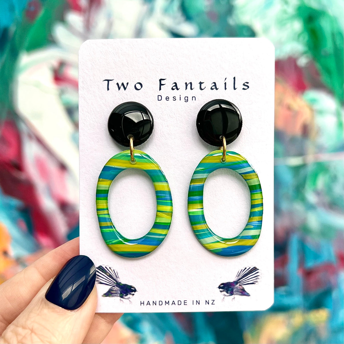Stripe Me Happy colourful blue green and yellow striped oval dangle earrings with black studs